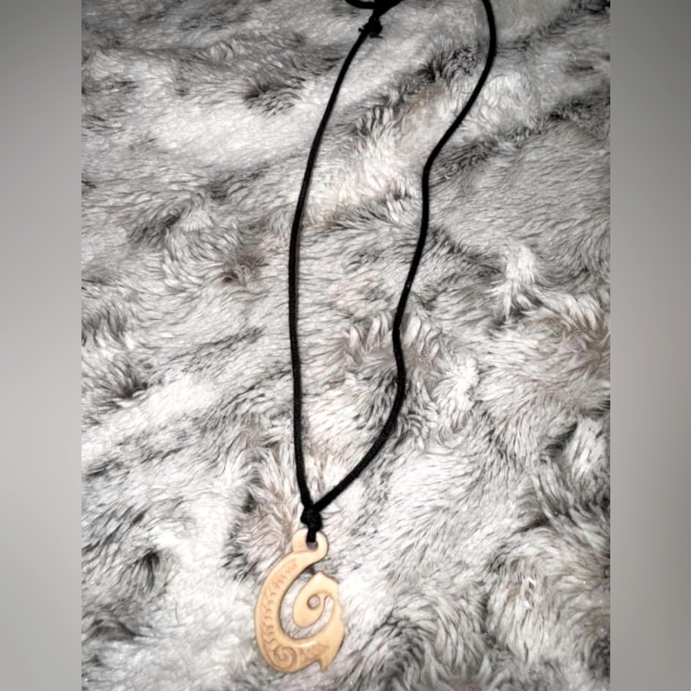 bone koru necklace with adjustable cord